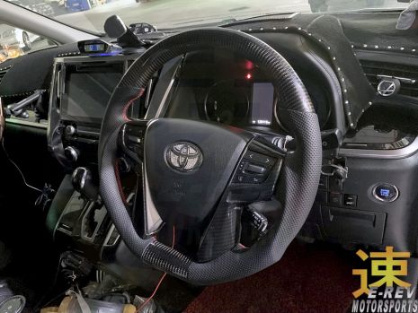 https://www.mycarforum.com/uploads/sgcarstore/data/1/1_1654488114_0Toyota-Vellfire-2015-Carbon-Fibre-Steering-Wheel-Pic-1.jpg