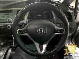 https://www.mycarforum.com/uploads/sgcarstore/data/1/HondaCivicFDCarbonFibreSteeringWheelInstalled_39831_1.jpg