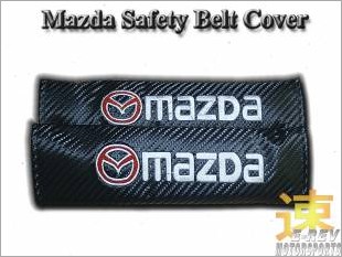 https://www.mycarforum.com/uploads/sgcarstore/data/1/MazdaCarbonFiberLookSafetyBeltCoverWhiteWording_17398_1.jpg