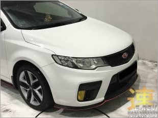 https://www.mycarforum.com/uploads/sgcarstore/data/3/KiaKoupWhiteTwoToneSamuraiLip_54553_1.jpg